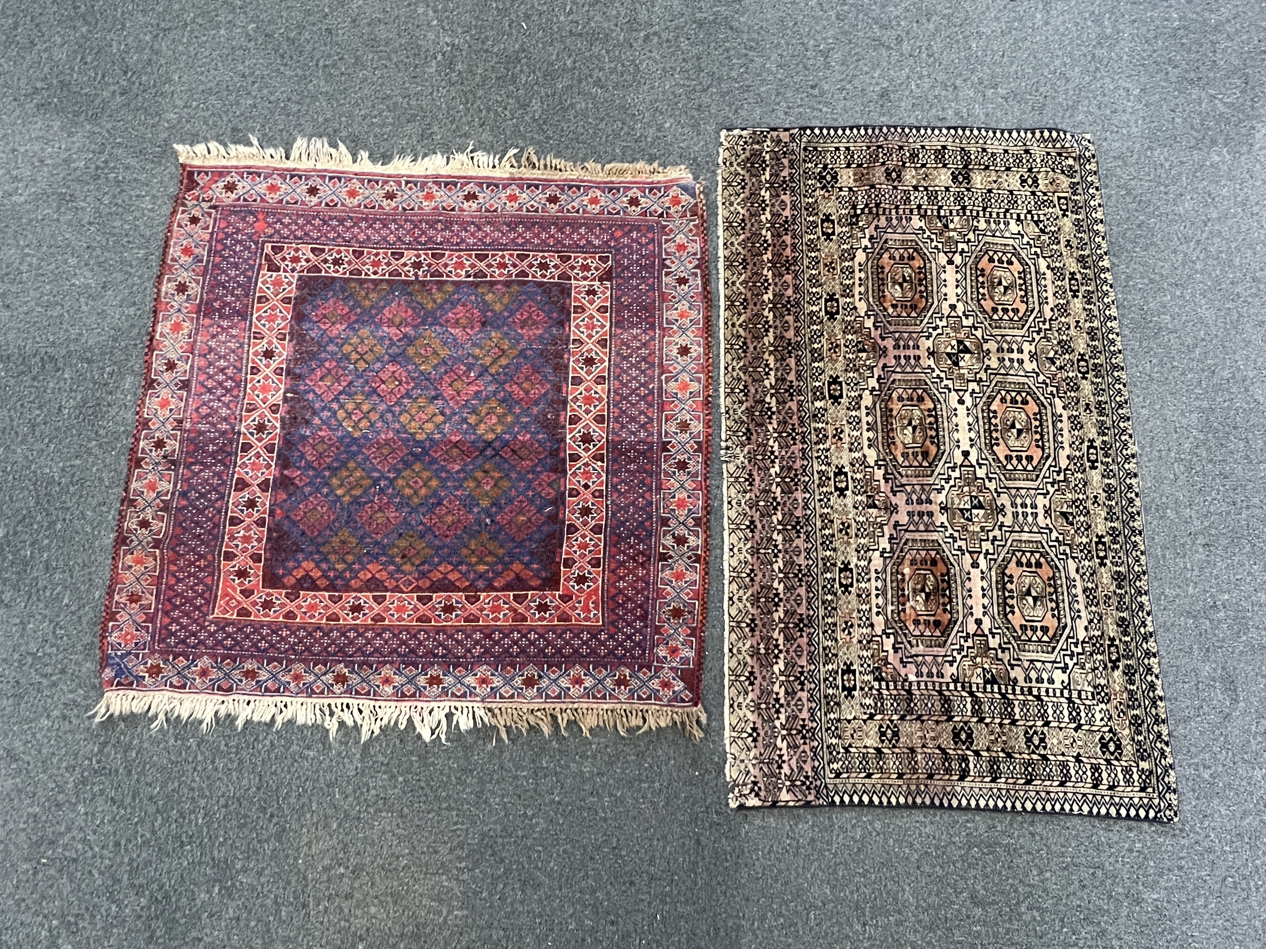 Two Afghan rugs / saddlebags, larger 104 x 108cm. Condition - fair